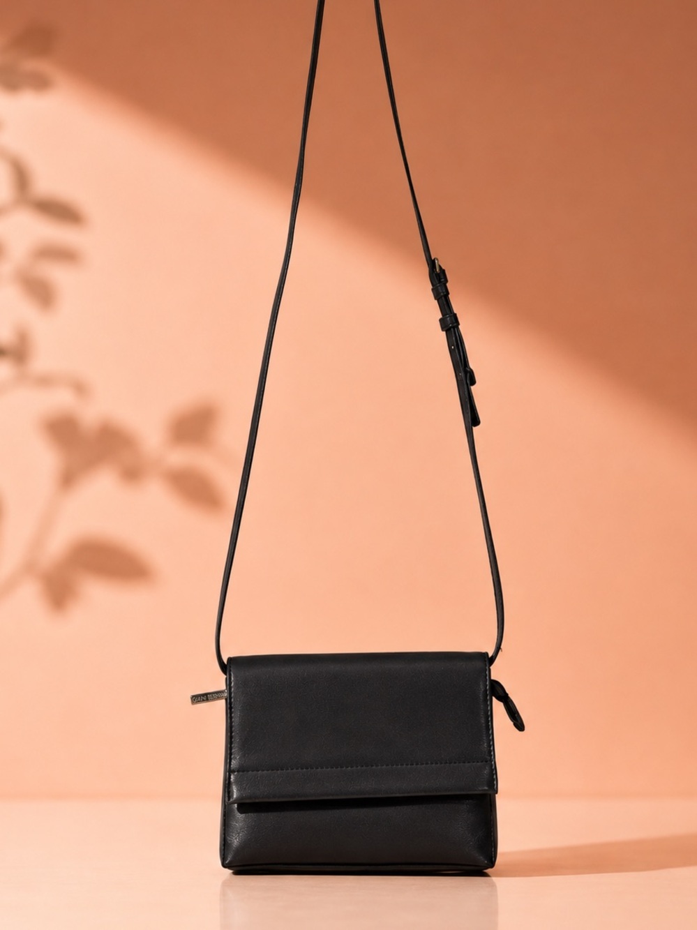 GIANI BERNINI black Crossbody Bag | adjustable strap | plastic on hardware